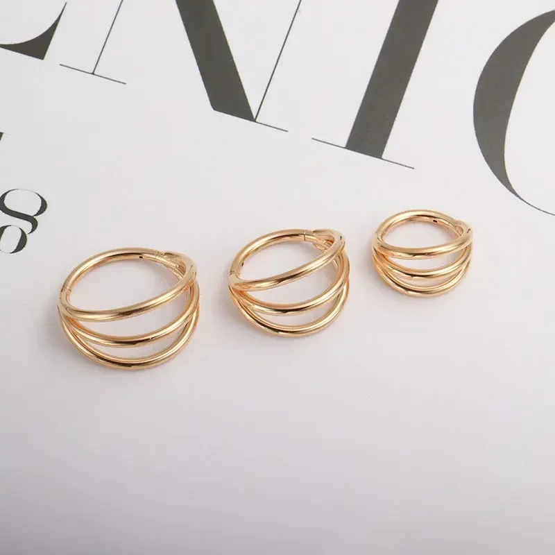 ASTM F136 التيتانيوم 3 طبقة مت - مراجعة Zoor Body Jewelry وسعره