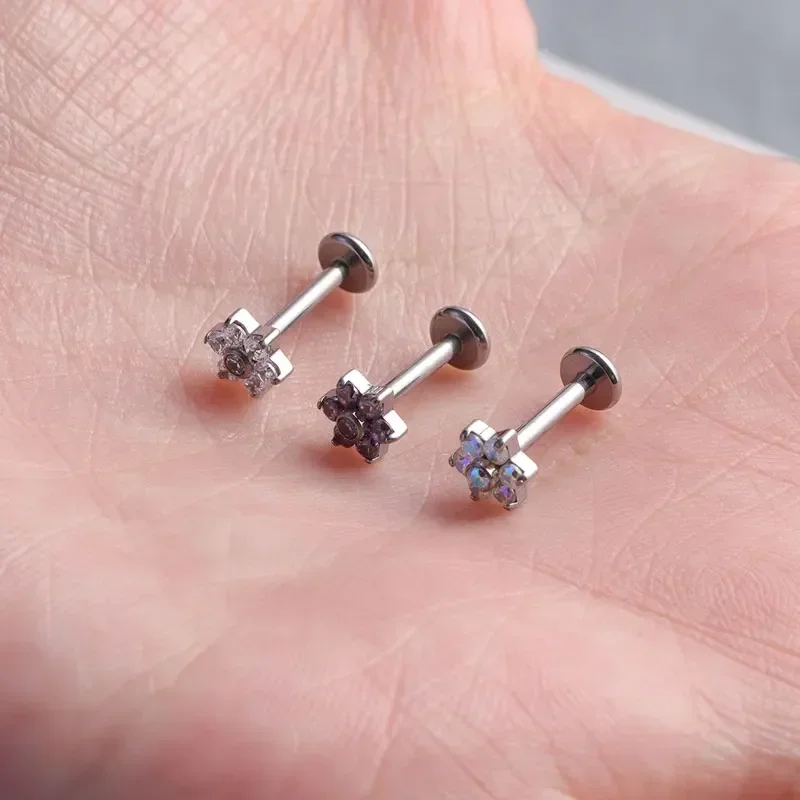 ASTM F136 ثقب زهرة التيتانيوم  - مراجعة Zoor Body Jewelry وسعره