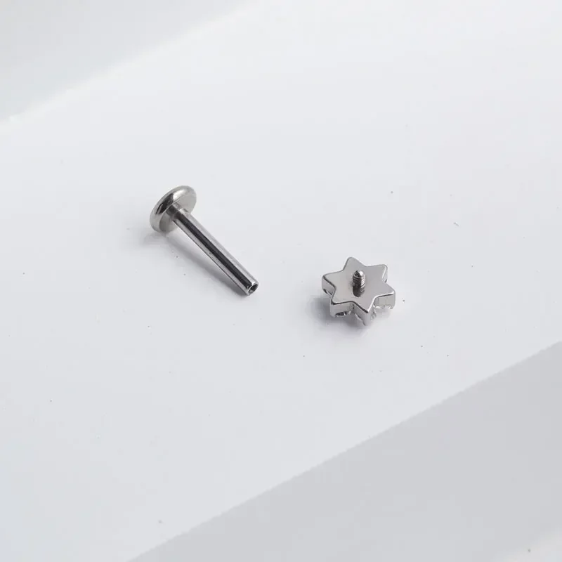 ASTM F136 ثقب زهرة التيتانيوم  - مراجعة Zoor Body Jewelry وسعره
